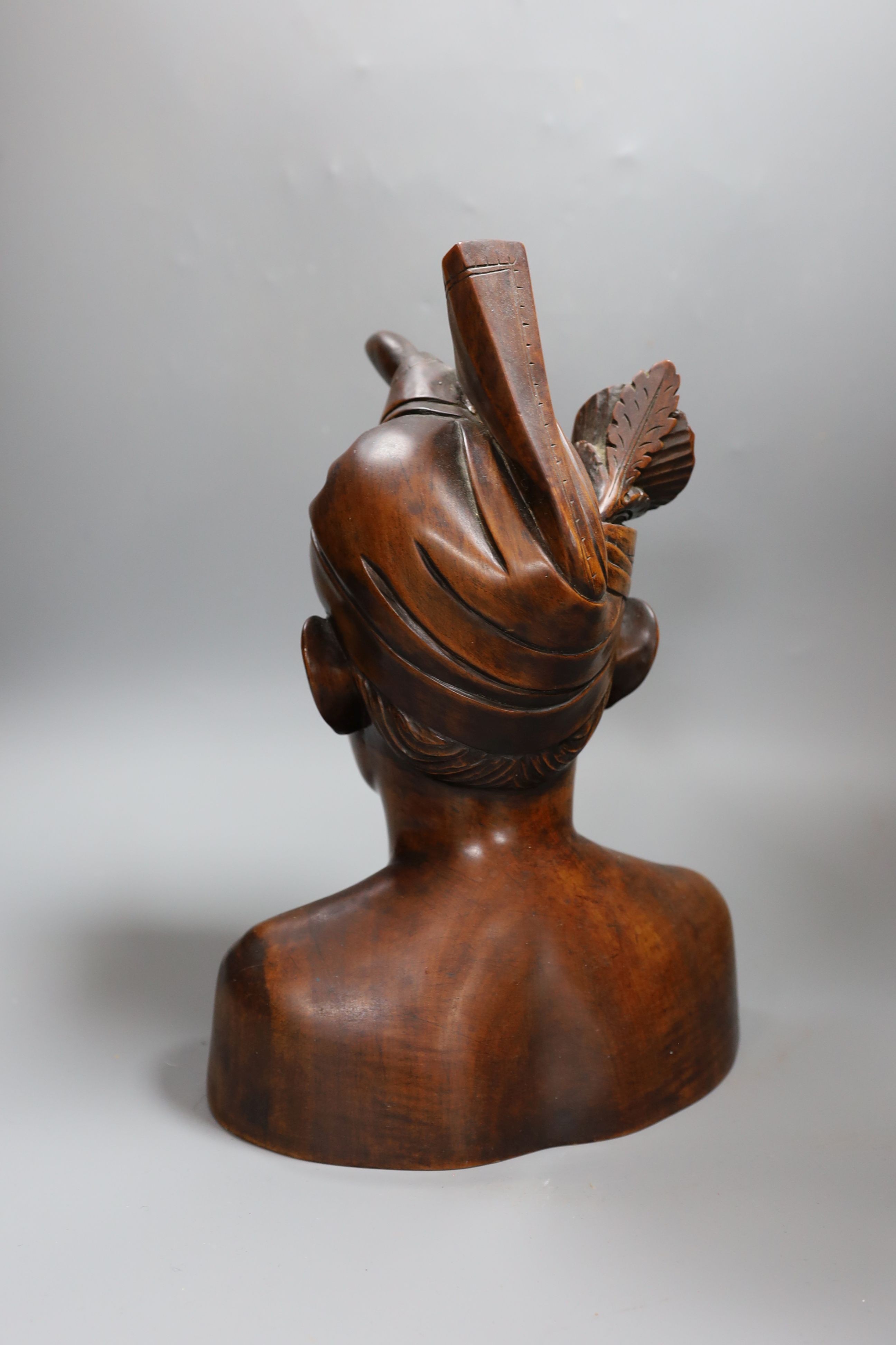 A carved wood bust 33cm